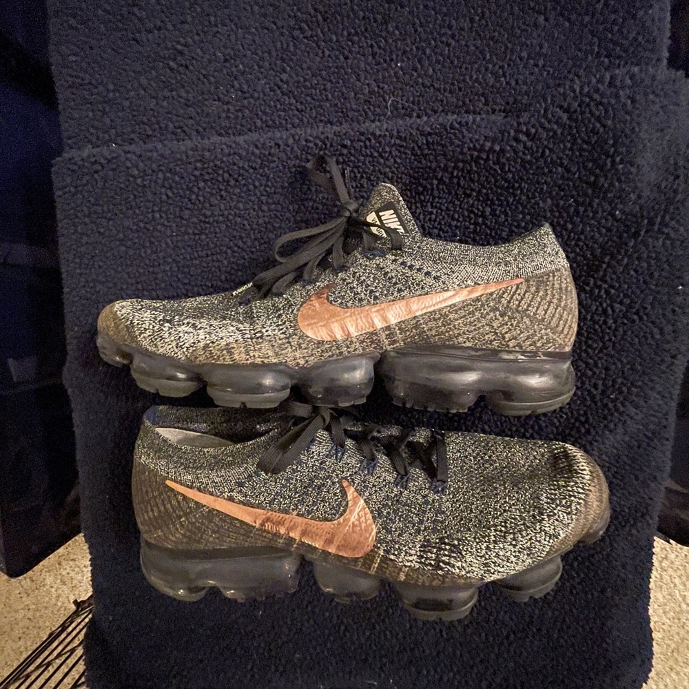 Nike Black and Bronze Flyknit Vapormax sneakers